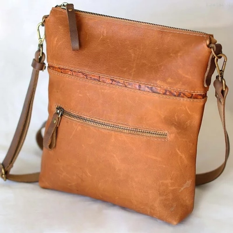 Somerset. Double sided leather crossbody bag