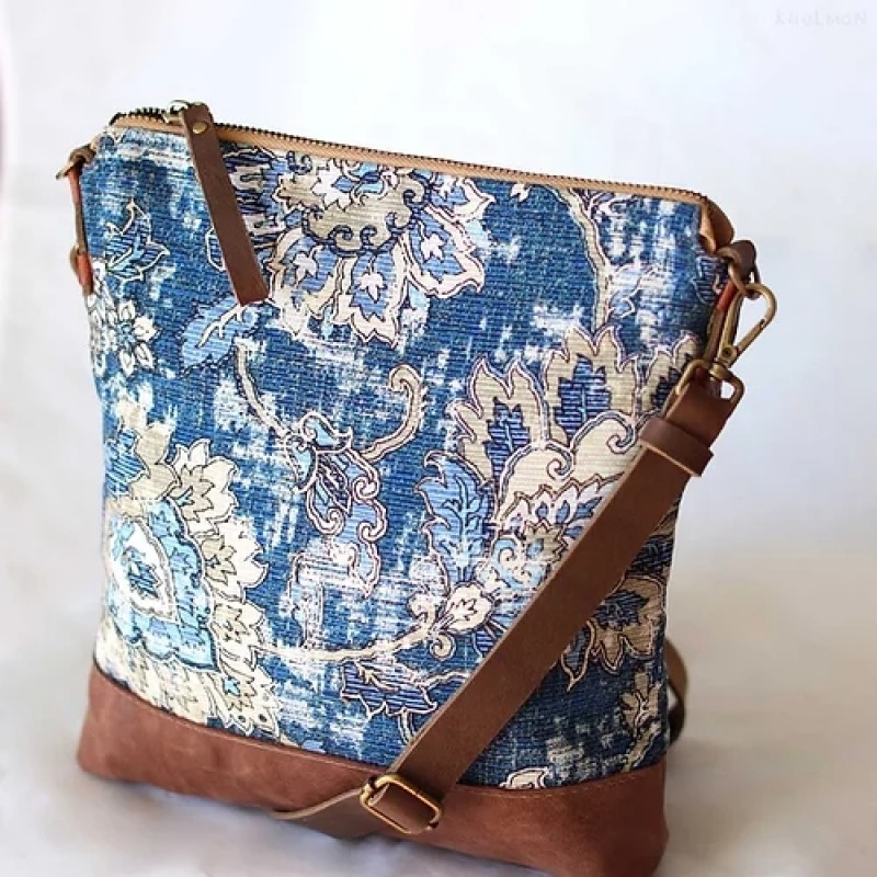 Somerset. Double sided leather crossbody bag