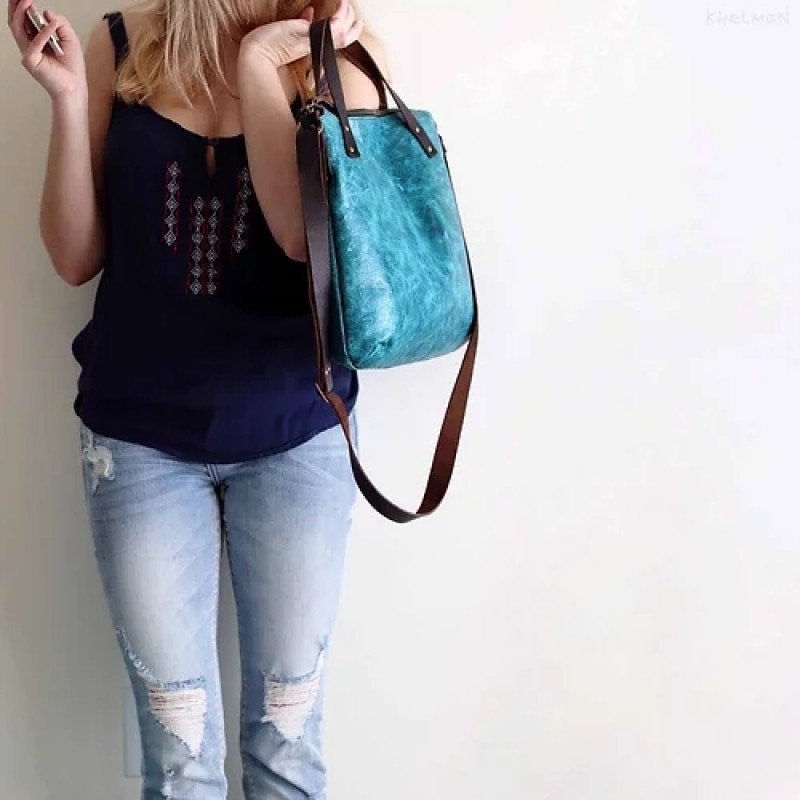 Austin. Turquoise leather crossbody tote