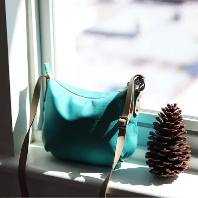 Borla. Turquoise teal crossbody bag