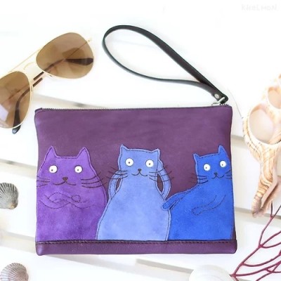 Suede Cats. Leather clutch