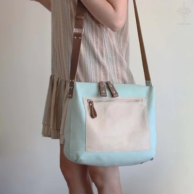 Solaris. Light turquoise leather crossbody bag